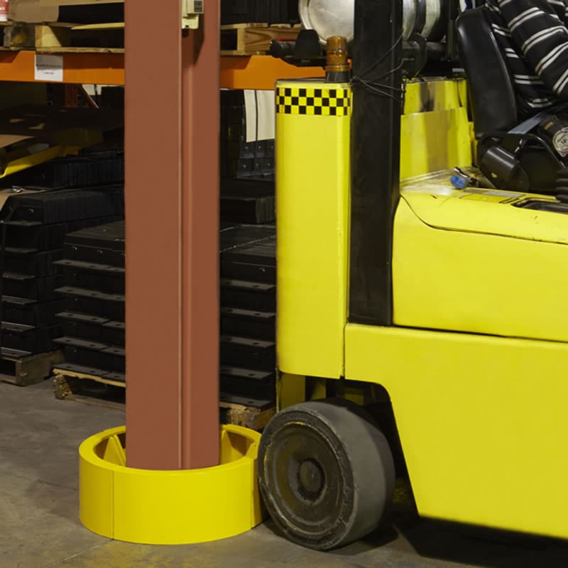 Column protector guarding against forklift impact in a warehouse