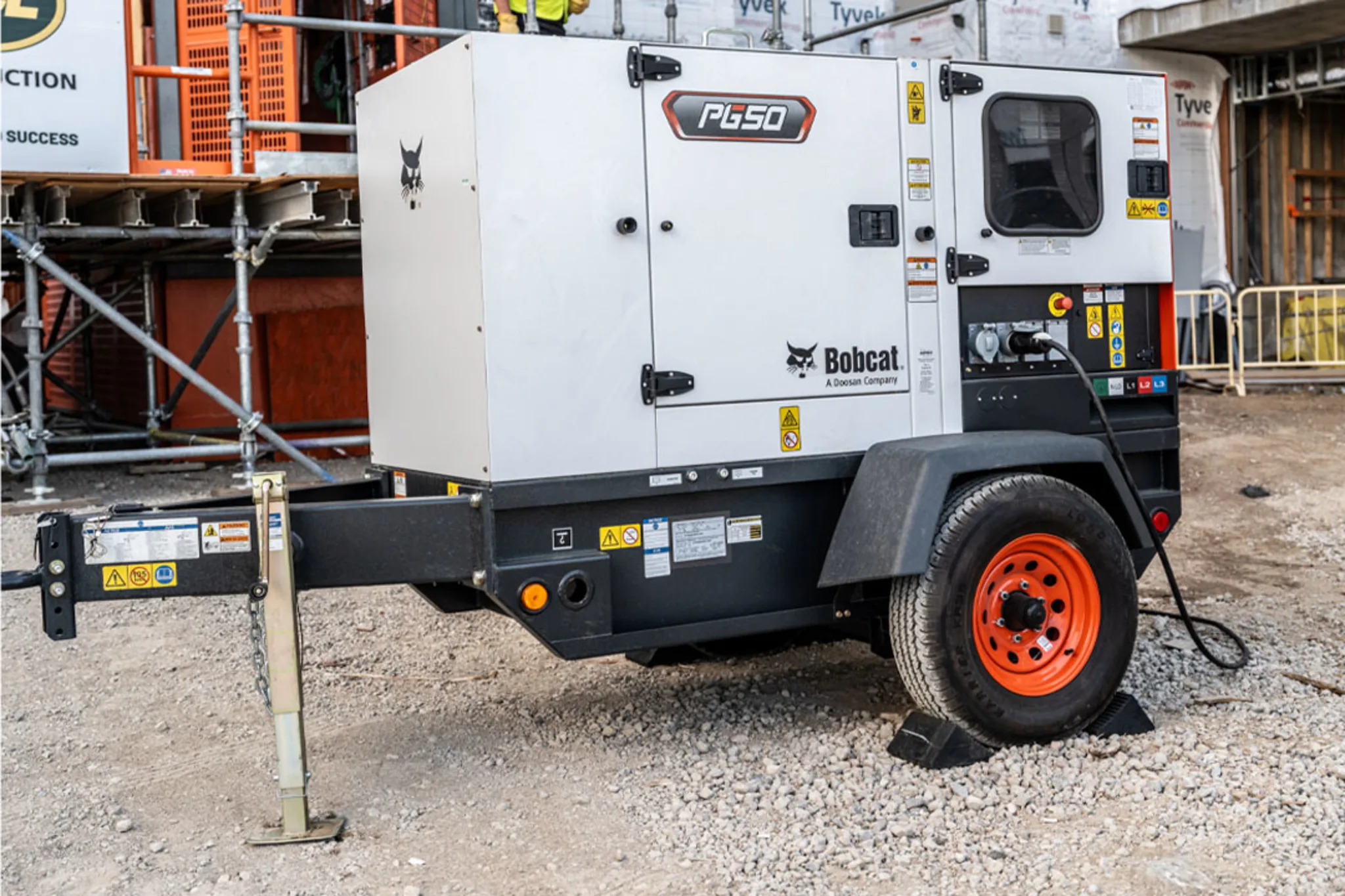 Towable portable generator at a commercial construction site