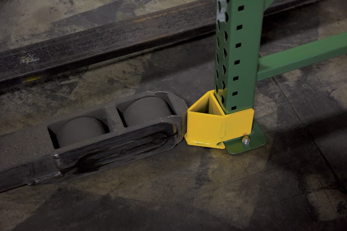 Rack leg protectors installed on a warehouse pallet rack