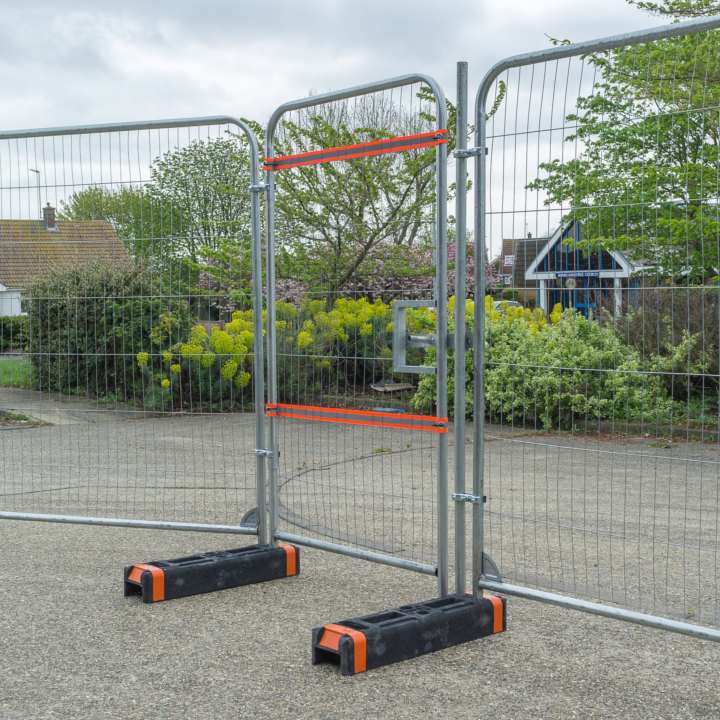 Temporary fence pedestrian gate installed at a construction site