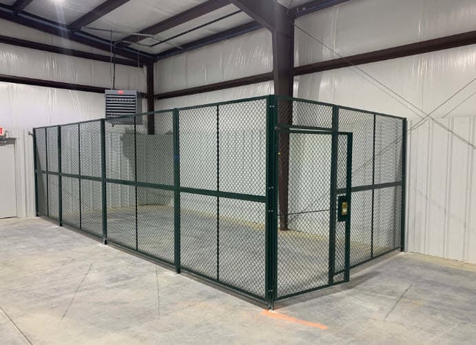Wire mesh security cage installed inside a warehouse