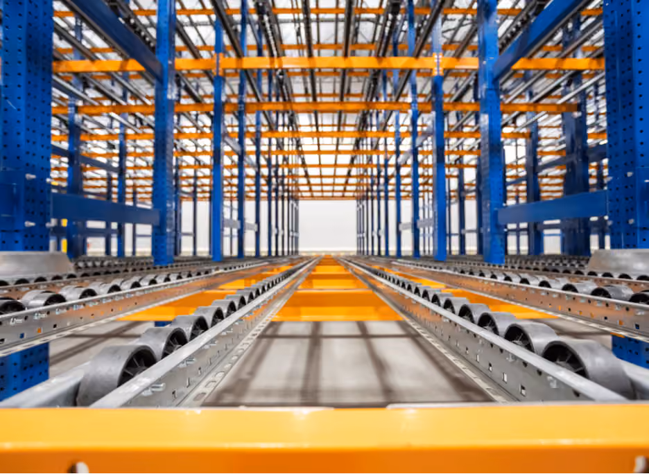 Warehouse interior with pallet racking and material-handling lanes