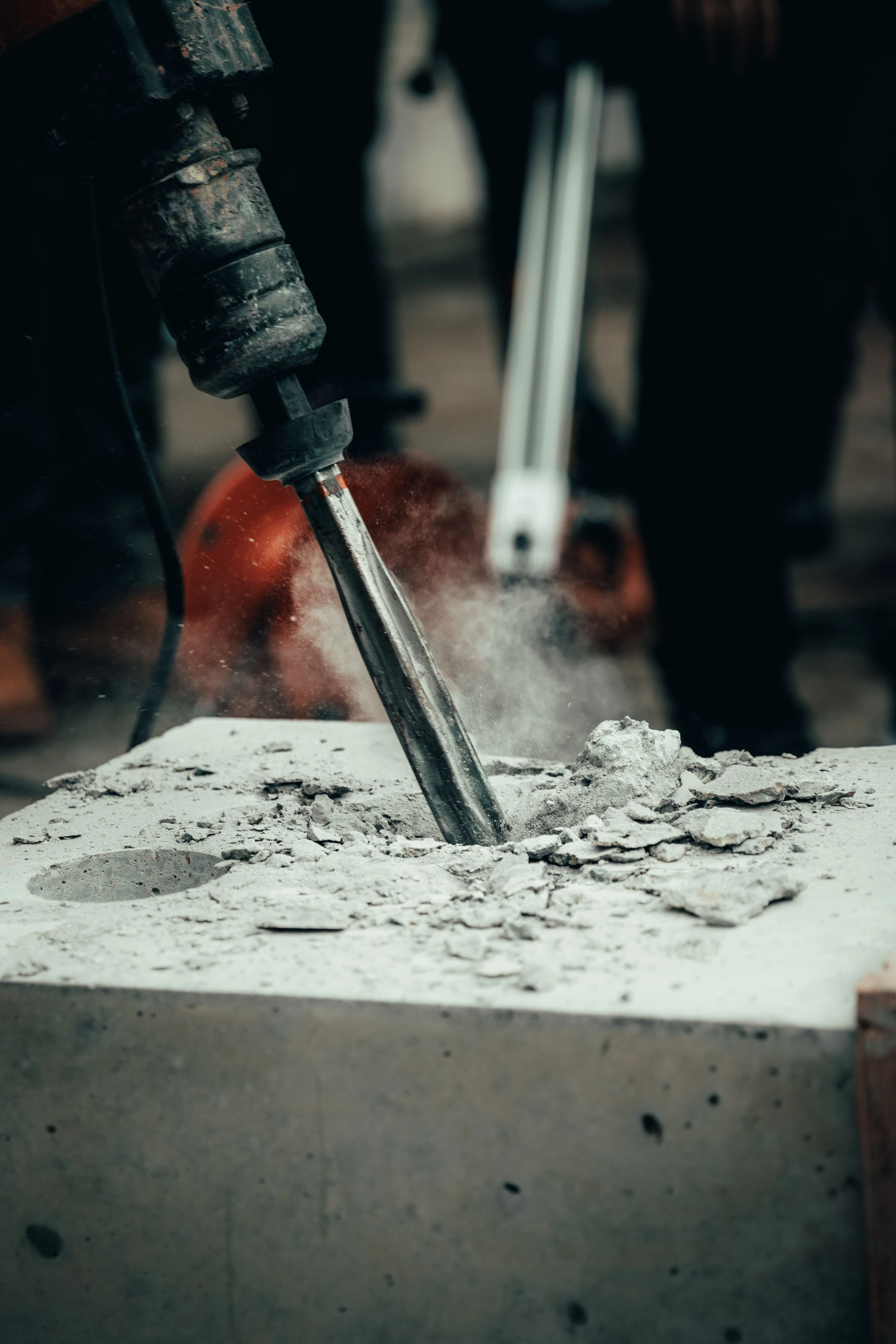 Powered chisel removing material during a renovation