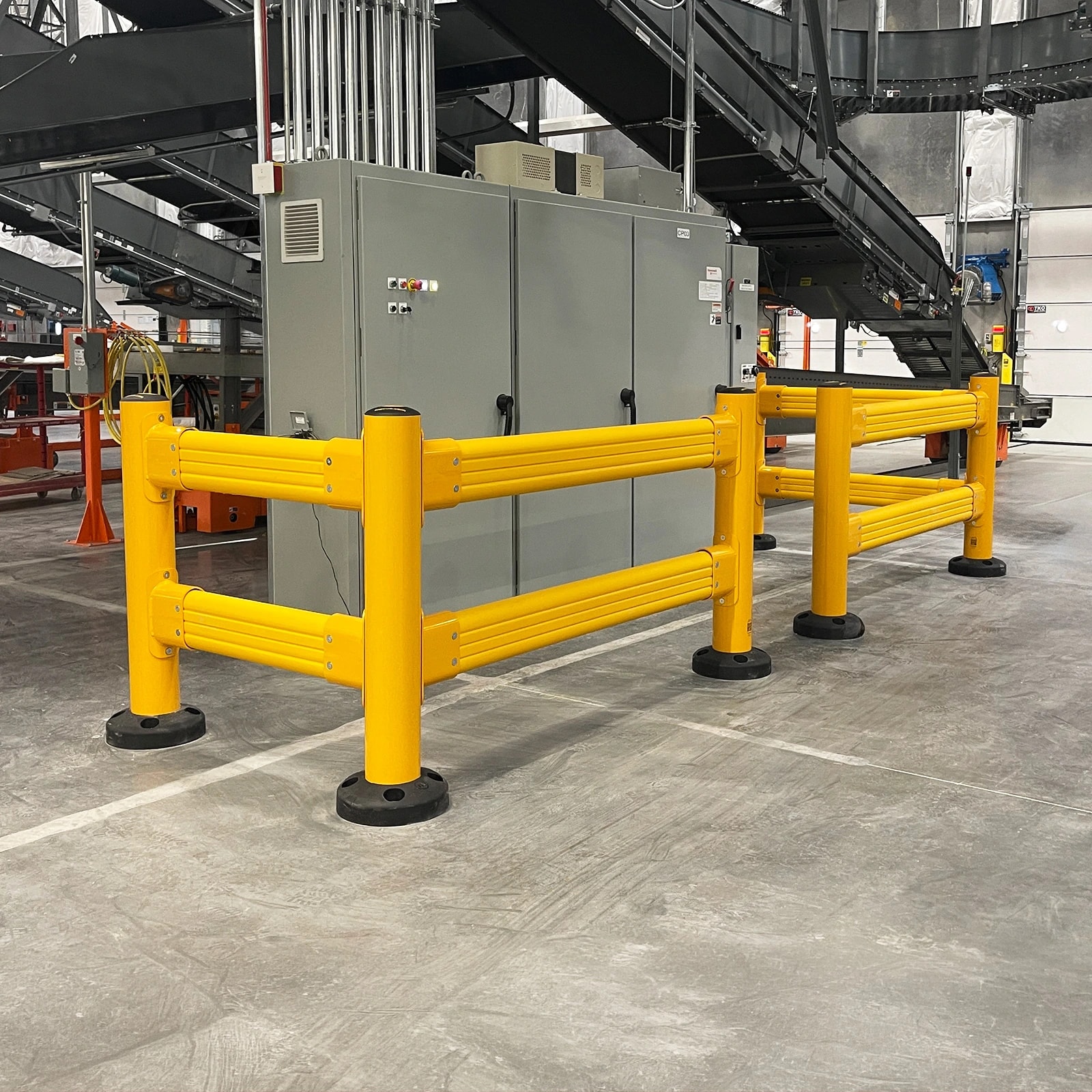 Guardrails surrounding control equipment and conveyors