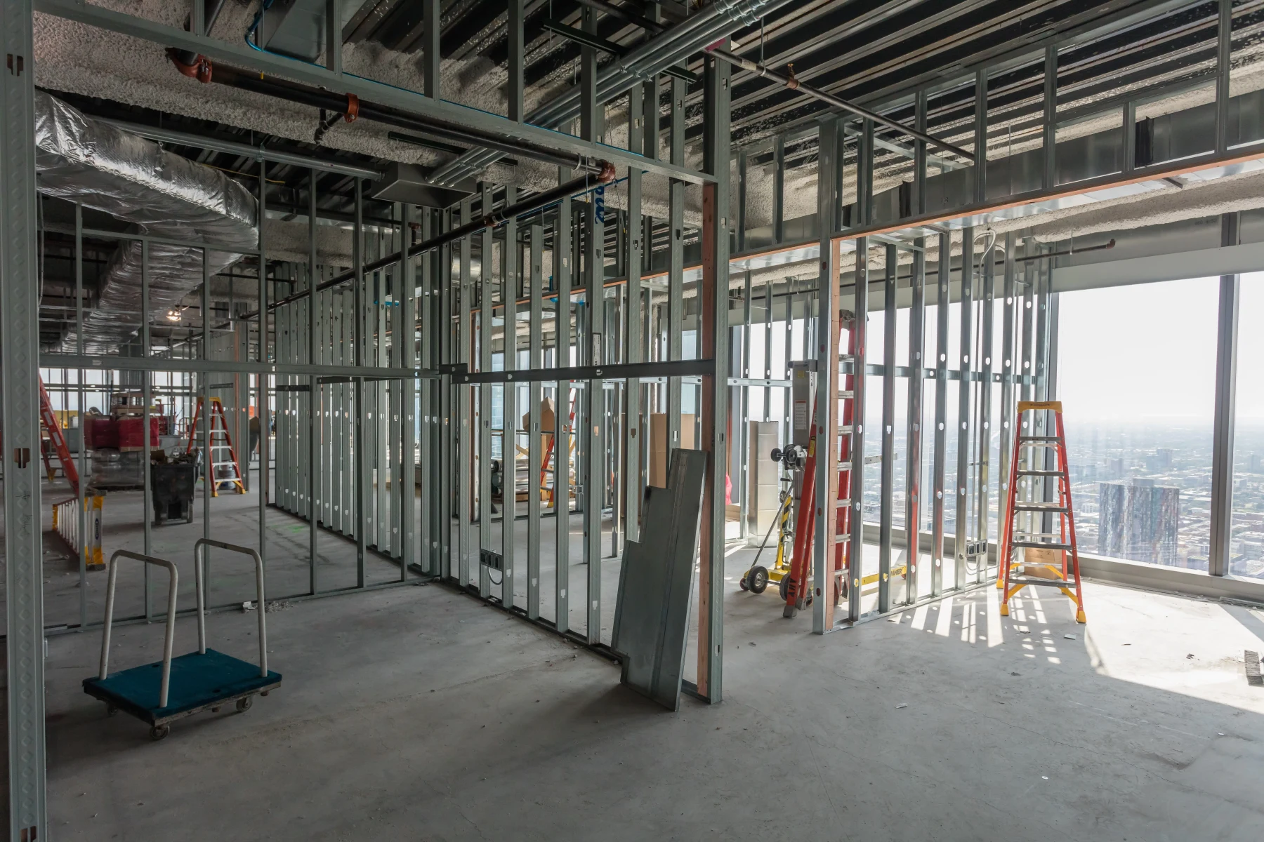 Metal-stud partitions forming a commercial interior