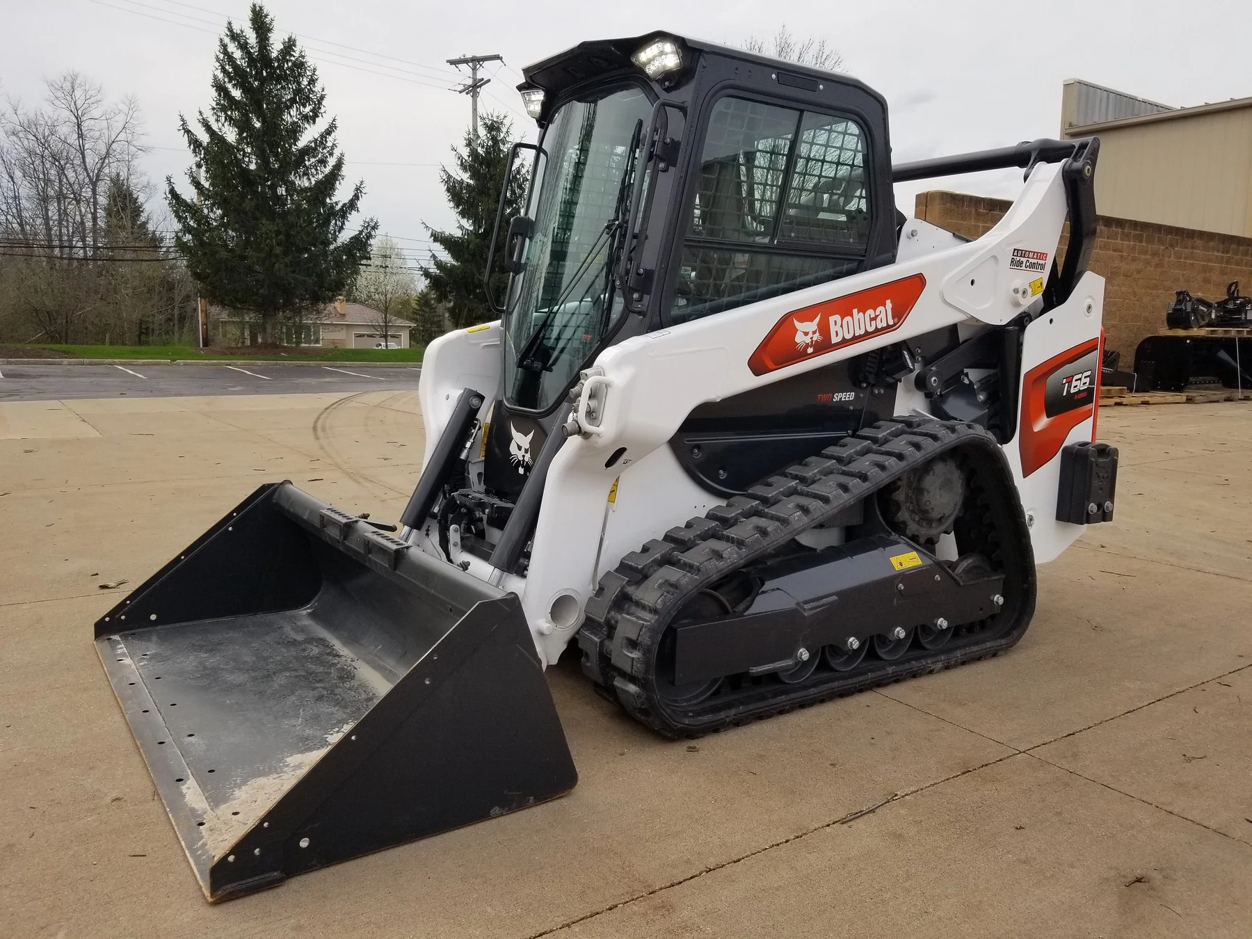 Compact track loader with front bucket