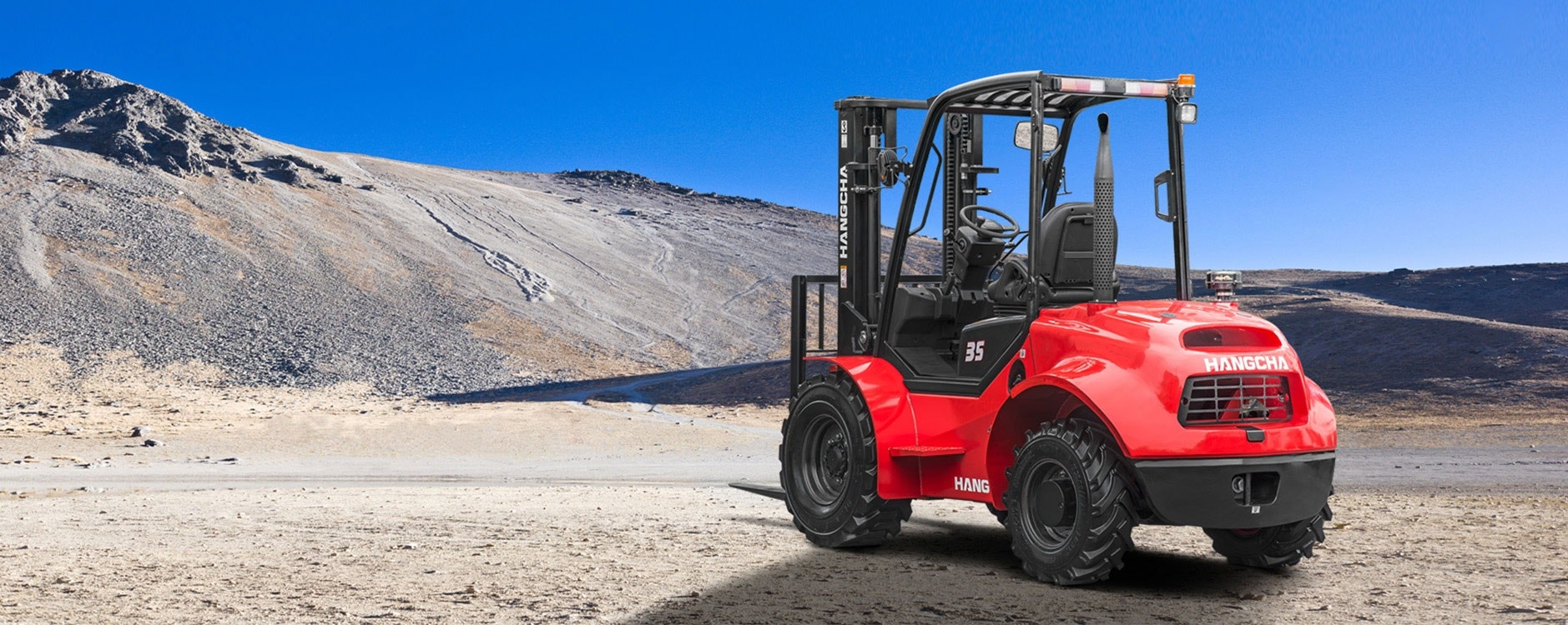 Rough-terrain forklift on an outdoor site